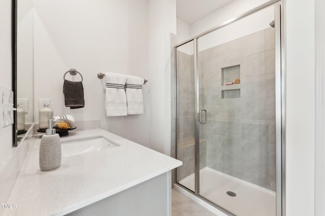 full bathroom featuring vanity and a stall shower