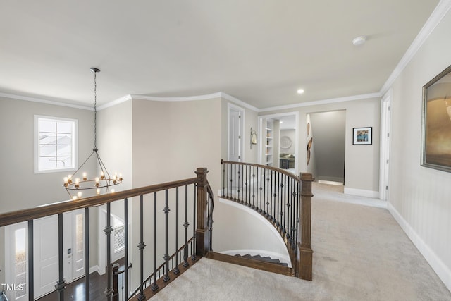 staircase featuring baseboards, a chandelier, ornamental molding, carpet, and recessed lighting