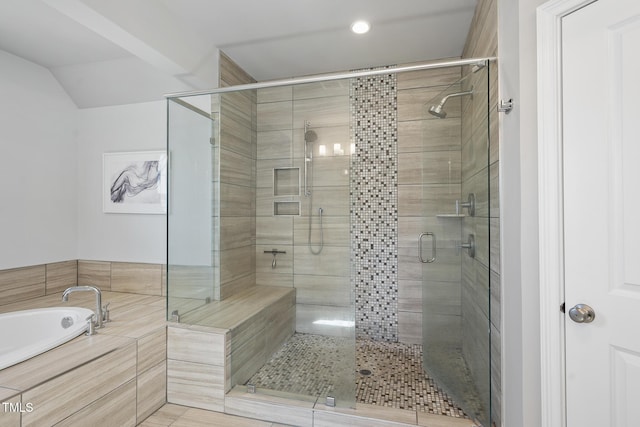 bathroom featuring a shower stall, recessed lighting, a garden tub, and lofted ceiling
