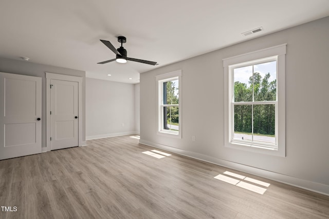 unfurnished bedroom with visible vents, baseboards, ceiling fan, recessed lighting, and light wood-type flooring