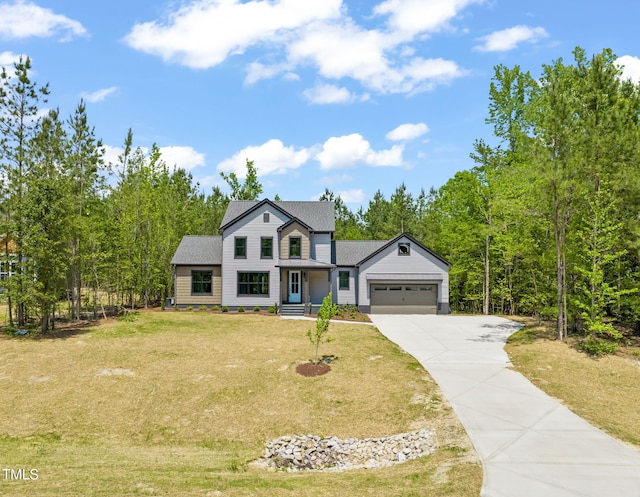 view of front of house featuring a garage, a front lawn, roof with shingles, and concrete driveway