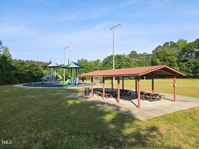 surrounding community with a yard, a gazebo, and playground community