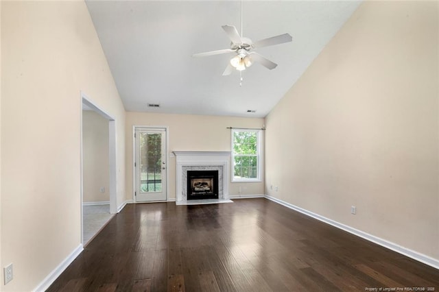 2495 Ohara Dr, Raeford, NC 28376 - unfurnished living room featuring ceiling fan, visible vents, baseboards, lofted ceiling, and dark wood-type flooring