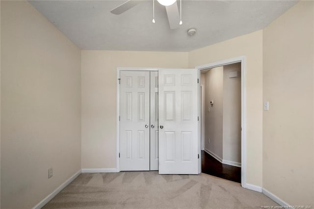2495 Ohara Dr, Raeford, NC 28376 - unfurnished bedroom featuring carpet floors, baseboards, a closet, and ceiling fan