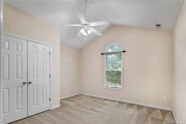 2495 Ohara Dr, Raeford, NC 28376 - unfurnished bedroom featuring baseboards, lofted ceiling, carpet, and a closet