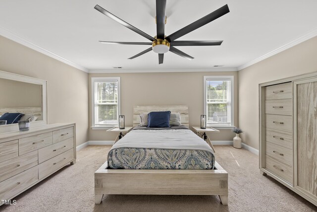 bedroom with multiple windows, light carpet, and ornamental molding