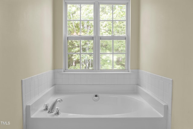 bathroom featuring a bath