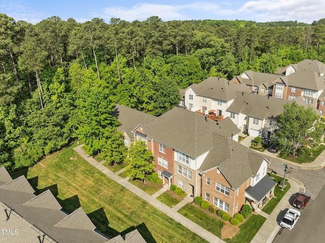 bird's eye view with a residential view and a forest view