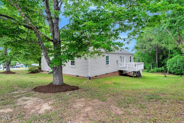 view of yard with a deck