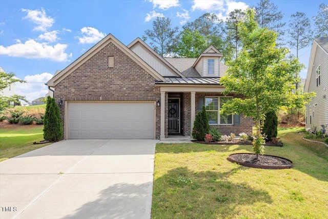 52 Brunello Ct, Clayton, NC 27527 - view of front of property featuring an attached garage, driveway, a front lawn, and brick siding