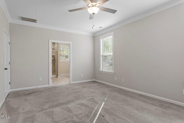 52 Brunello Ct, Clayton, NC 27527 - unfurnished bedroom featuring baseboards, visible vents, ornamental molding, and carpet