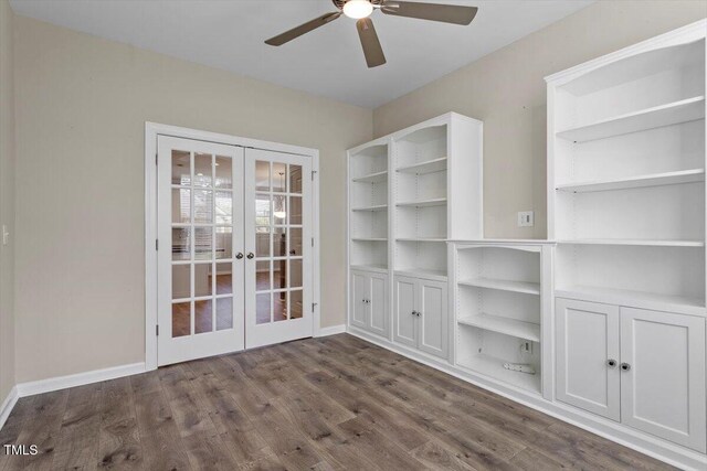 52 Brunello Ct, Clayton, NC 27527 - spare room featuring baseboards, ceiling fan, french doors, and dark wood-type flooring