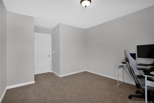 office featuring baseboards and carpet
