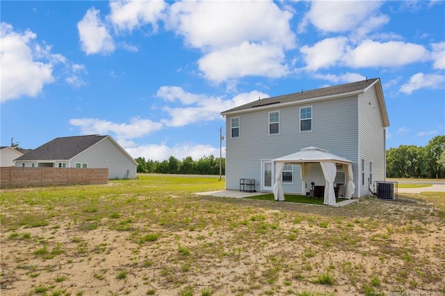 566 Carolina Church Rd, Saint Pauls, NC 28384 - back of house with a gazebo, central AC unit, and a patio area