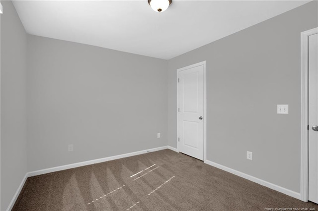 566 Carolina Church Rd, Saint Pauls, NC 28384 - carpeted empty room with baseboards