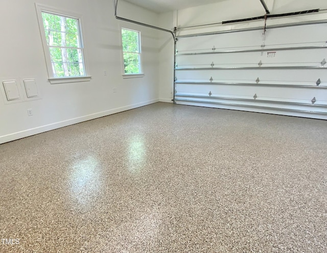 garage featuring baseboards