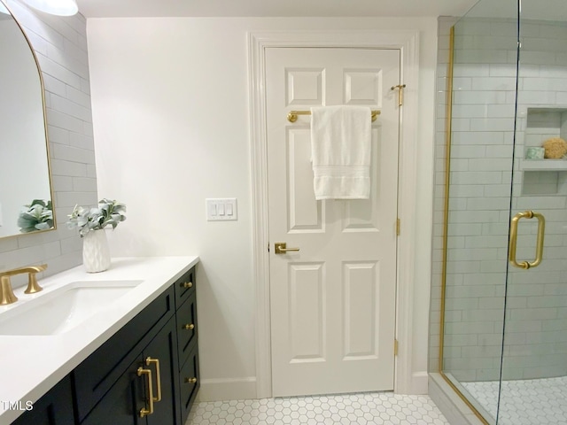 full bathroom with vanity, tile patterned floors, and a stall shower