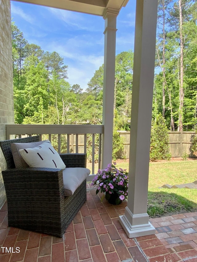 view of patio / terrace featuring fence