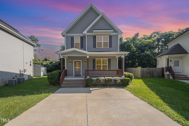 107 Cottage Ct, Youngsville, NC 27596 - view of front facade featuring covered porch and board and batten siding