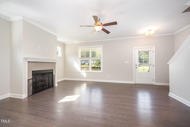 107 Cottage Ct, Youngsville, NC 27596 - unfurnished living room featuring a ceiling fan, a fireplace, dark wood-style flooring, and ornamental molding