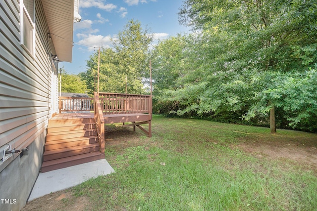 107 Cottage Ct, Youngsville, NC 27596 - view of grassy yard with a deck and stairway
