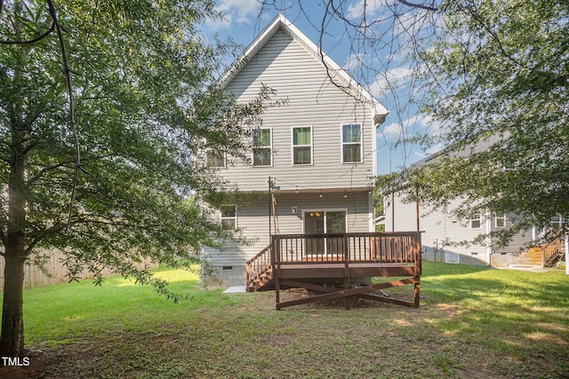 107 Cottage Ct, Youngsville, NC 27596 - back of house featuring crawl space, a wooden deck, and a yard