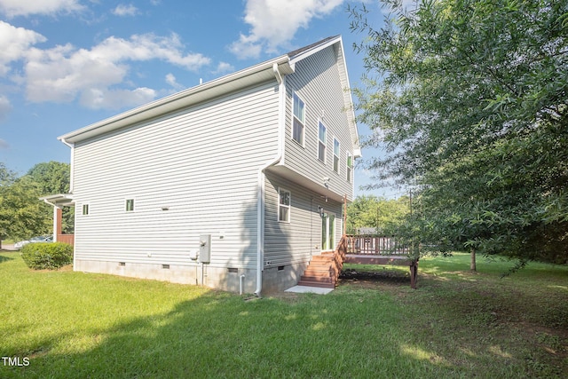 107 Cottage Ct, Youngsville, NC 27596 - view of side of property featuring crawl space, a lawn, and a wooden deck
