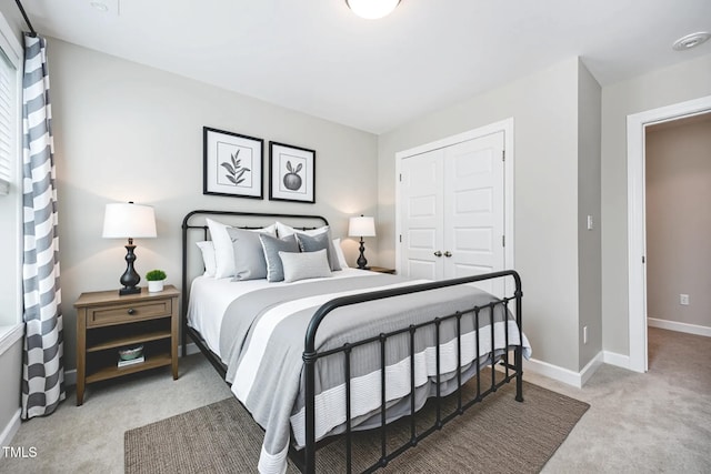 107 Cottage Ct, Youngsville, NC 27596 - bedroom featuring light carpet and a closet