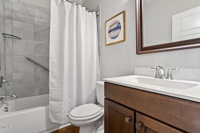 bathroom with vanity, toilet, and shower / bath combination with curtain