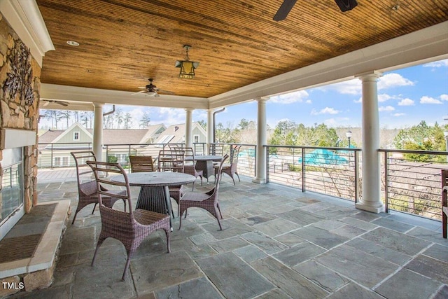 view of patio / terrace featuring ceiling fan