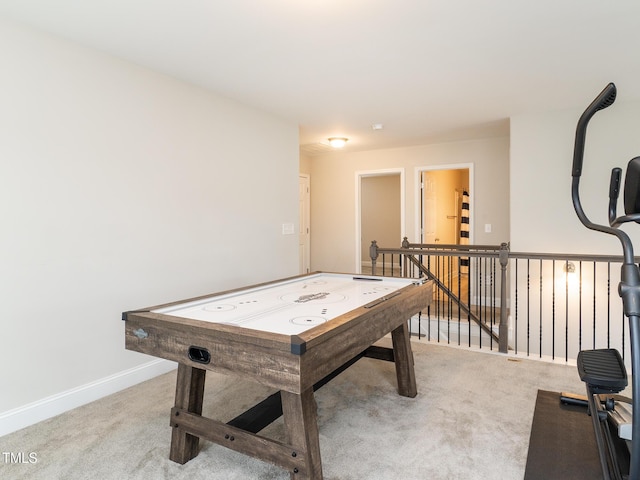 game room featuring carpet flooring and baseboards