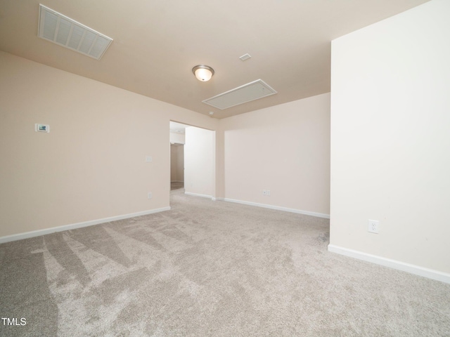 1218 S Franklin St, Wake Forest, NC 27587 - spare room featuring light carpet and baseboards