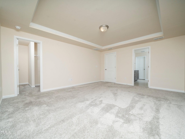 1218 S Franklin St, Wake Forest, NC 27587 - unfurnished room with a raised ceiling, crown molding, light carpet, baseboards, and a smoke detector