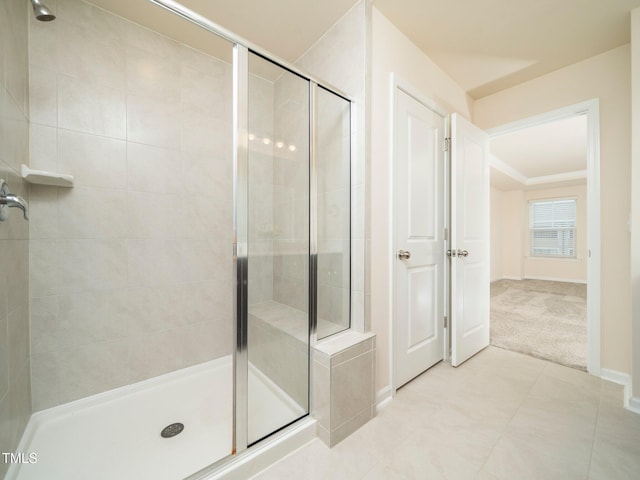 1218 S Franklin St, Wake Forest, NC 27587 - full bath with a shower stall, baseboards, and tile patterned floors