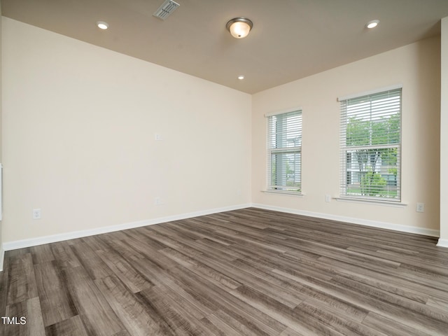 1218 S Franklin St, Wake Forest, NC 27587 - unfurnished room with dark wood-style floors, baseboards, and recessed lighting