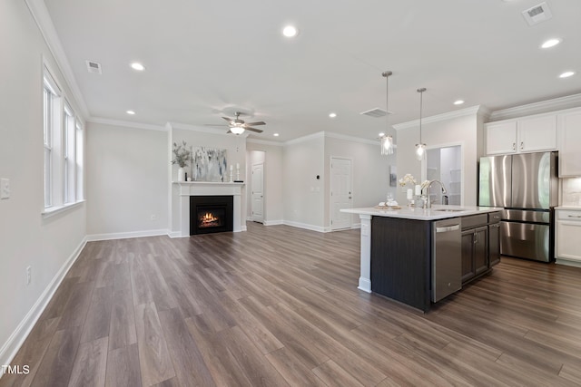 425 Shadow Falls Dr, Wendell, NC 27591 - kitchen featuring stainless steel appliances, a sink, light countertops, recessed lighting, and a ceiling fan