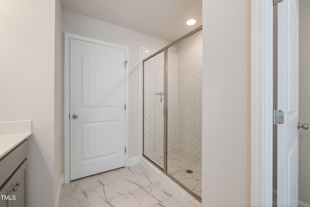 425 Shadow Falls Dr, Wendell, NC 27591 - bathroom with vanity, a stall shower, and marble look tiles