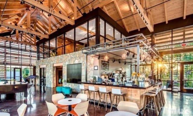 425 Shadow Falls Dr, Wendell, NC 27591 - bar area featuring high vaulted ceiling and wood ceiling with exposed beams