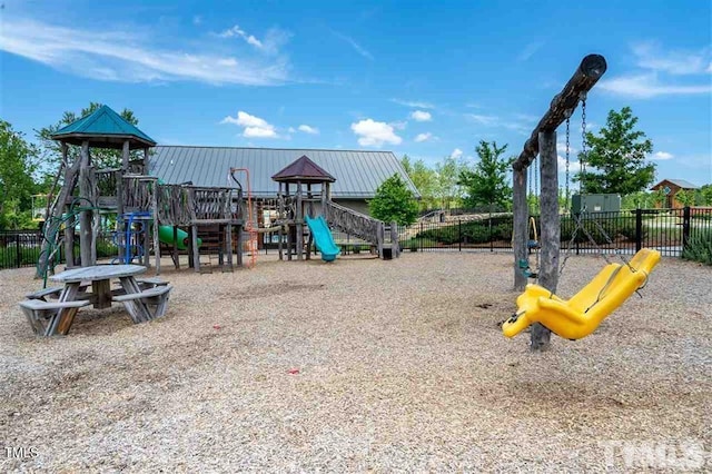 community jungle gym with fence