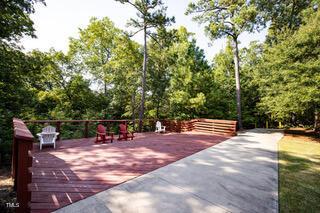 view of community with a wooden deck