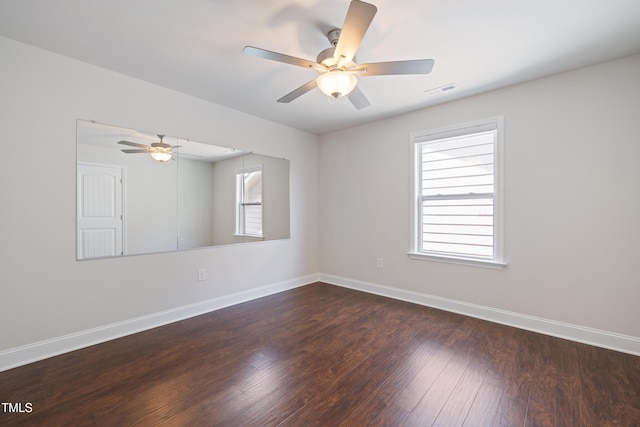 425 Shadow Falls Dr, Wendell, NC 27591 - unfurnished room featuring a ceiling fan, baseboards, and dark wood-style floors