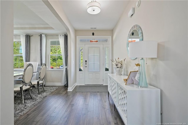 6528 Carswell Dr, Fayetteville, NC 28311 - foyer entrance with baseboards and dark wood-style flooring