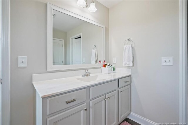 6528 Carswell Dr, Fayetteville, NC 28311 - bathroom with vanity and baseboards