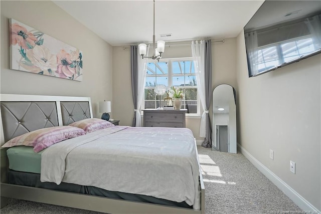 6528 Carswell Dr, Fayetteville, NC 28311 - bedroom featuring baseboards, carpet flooring, a chandelier, and visible vents