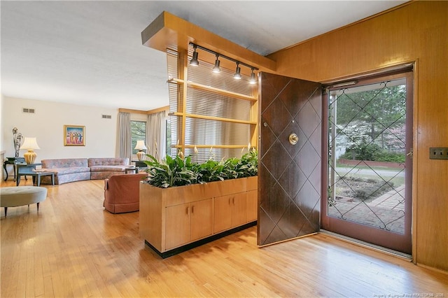 219 Devane St, Fayetteville, NC 28305 - interior space featuring light wood-style floors, track lighting, plenty of natural light, and visible vents