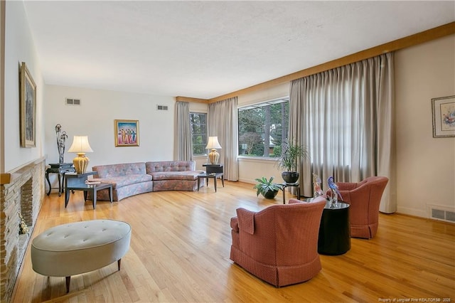 219 Devane St, Fayetteville, NC 28305 - living room featuring visible vents and wood finished floors