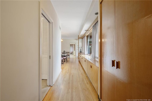 219 Devane St, Fayetteville, NC 28305 - corridor featuring baseboards and light wood-style flooring
