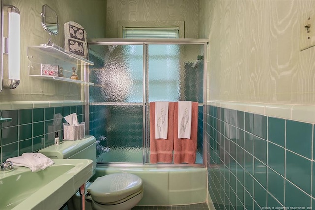 219 Devane St, Fayetteville, NC 28305 - bathroom with enclosed tub / shower combo, toilet, tile walls, and vanity