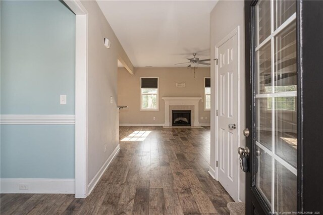 2109 Stonewash Dr, Fayetteville, NC 28306 - hallway with baseboards and dark wood-style flooring