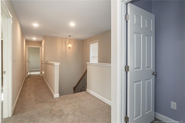 2109 Stonewash Dr, Fayetteville, NC 28306 - corridor featuring carpet floors, recessed lighting, baseboards, and an upstairs landing